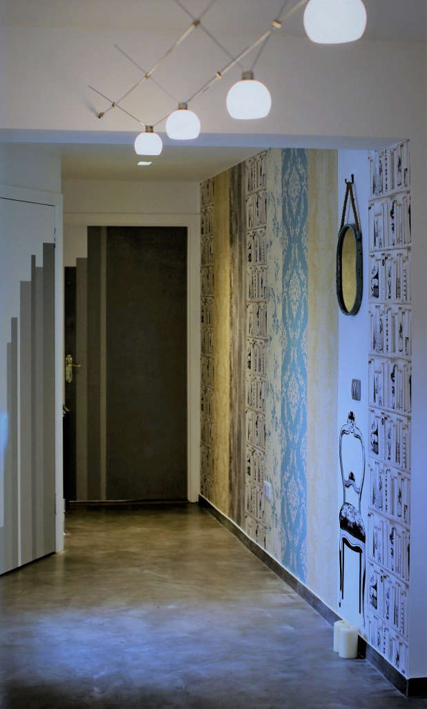 hall. wallpaper collage. recycled mirror. string lights. hand painted doors. 14