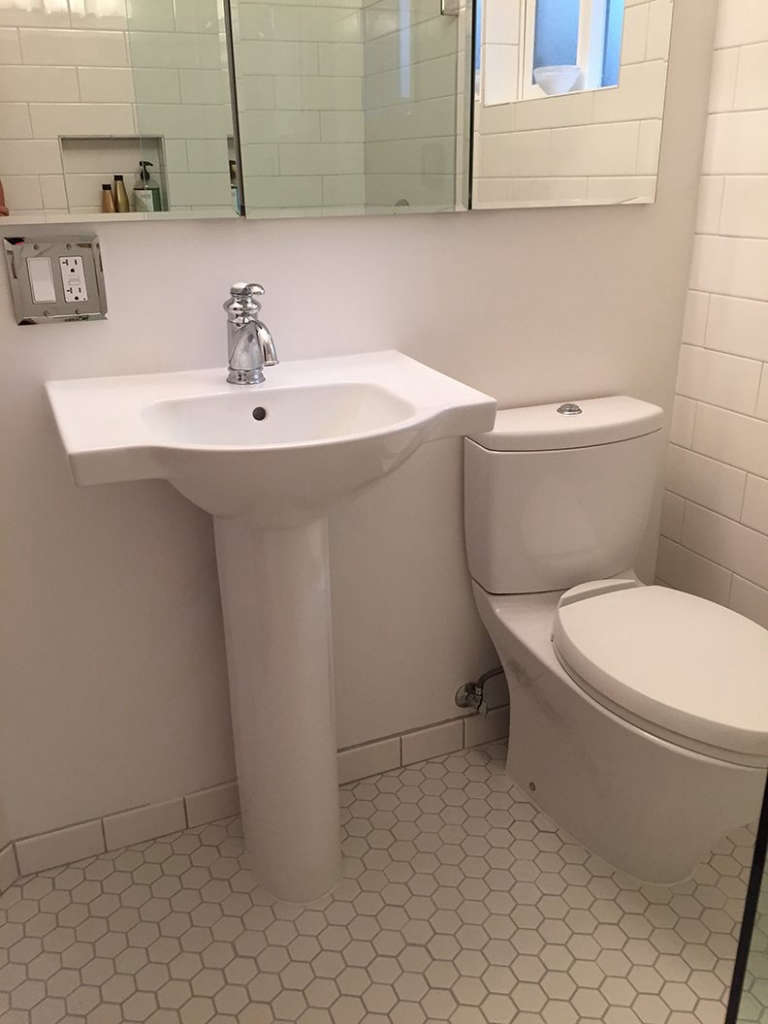 new sink, mirrored built in medicine cabinets, hex floor tiles 10