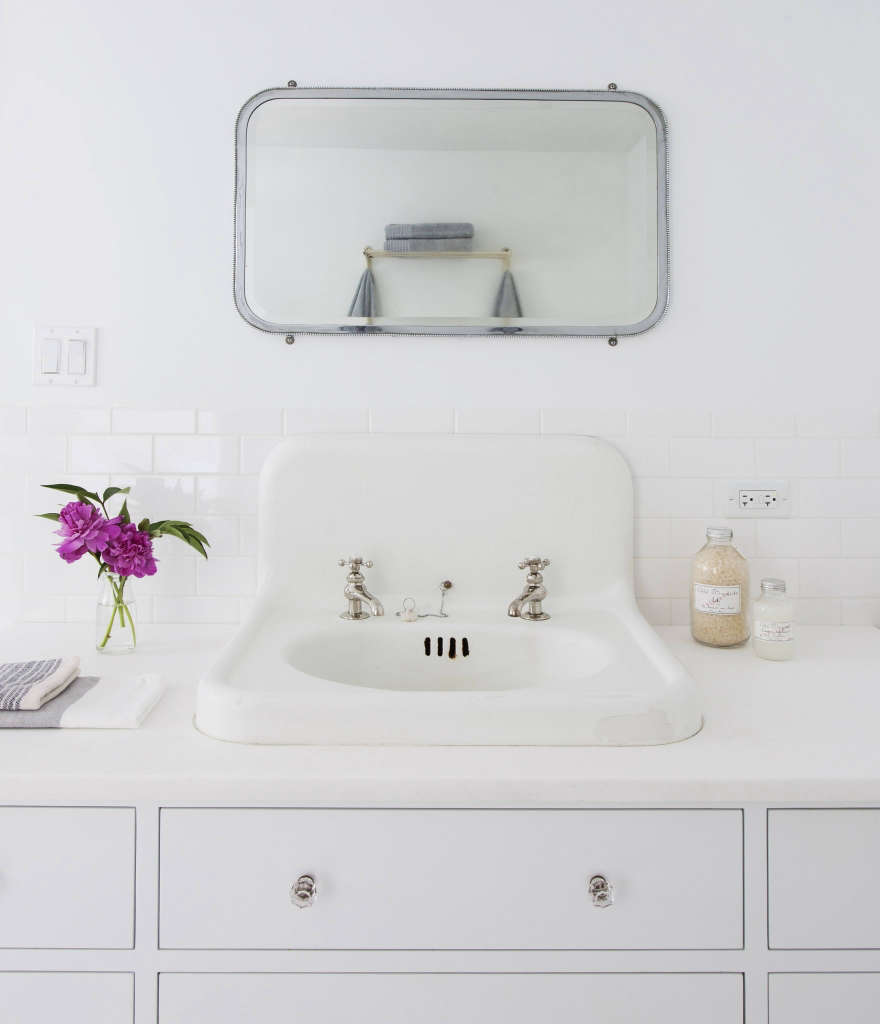 detail: vintage sink and mirror with custom vanity 12