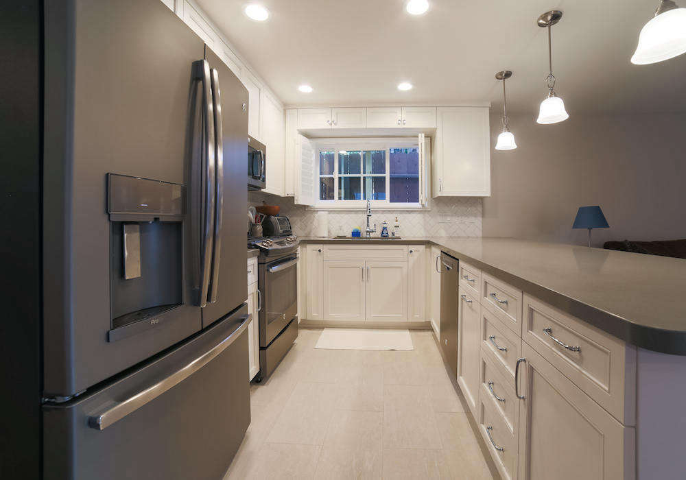 stainless steel appliances, fixtures, and finishes brighten things up. 8
