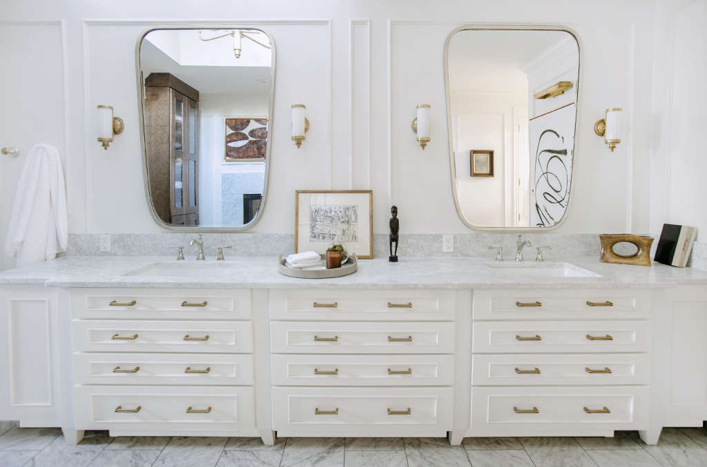 oversized custom vanity surrounded by classical millwork 7