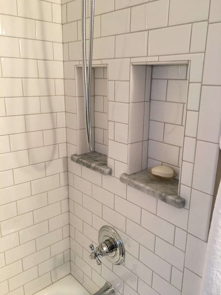 space for shampoo and soap was tucked in between the studs. 10