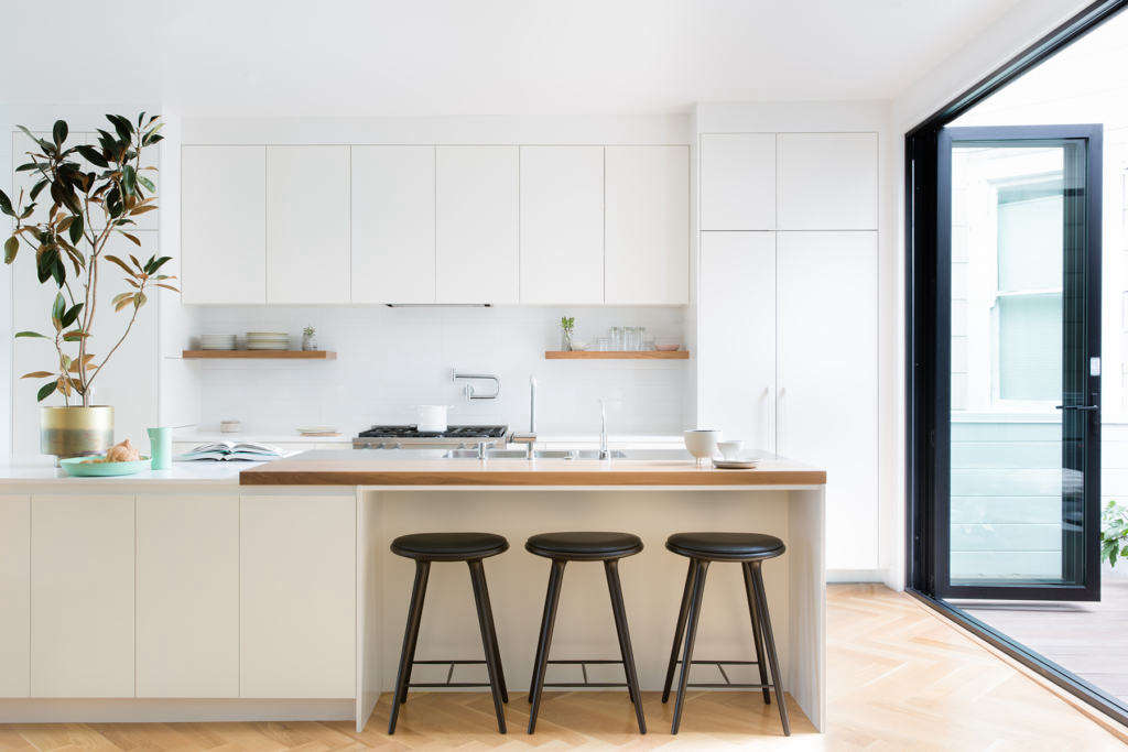 all white kitchen with contrasting pops 9