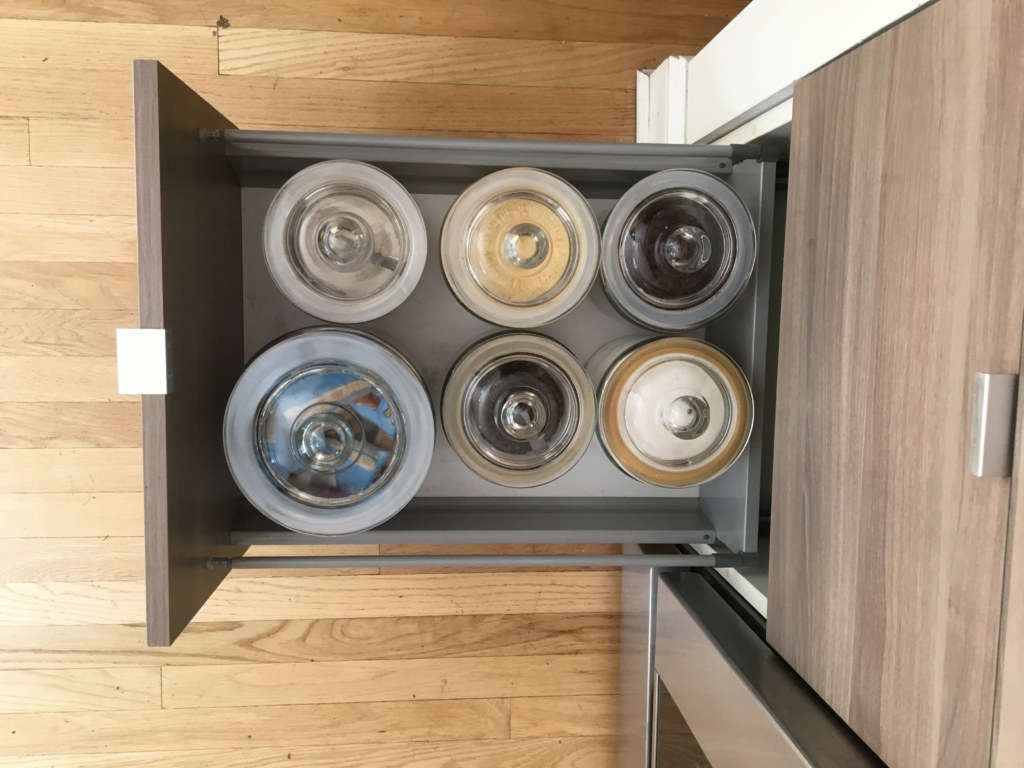 bottom pull out drawer with jars 16