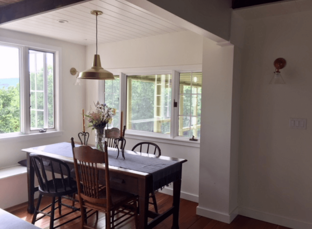 our dining room is perched between our kitchen island and the screened in porch. 12
